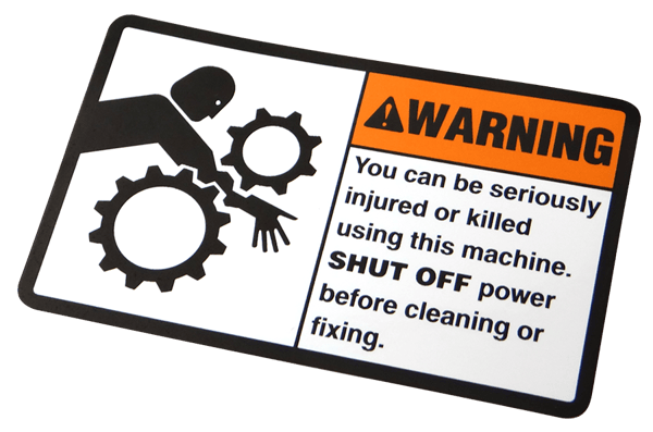 Custom warning and safety labels provide cautionary information on industrial equipment