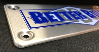 formed edge on aluminum badge