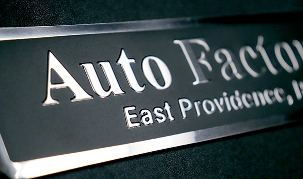 low gloss black embossed aluminum nameplate